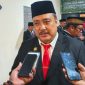 Kepala Dinas Pemberdayaan Masyarakat dan Desa (DPMD) Kabupaten Sumenep, Achmad Dzulkarnain, memberikan keterangan kepada awak media terkait persiapan Pemilihan Kepala Desa (Pilkades) Serentak 2027 yang akan diikuti 246 desa di Kabupaten Sumenep. (Foto: Istimewa).